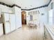 Bright kitchen features a refrigerator and ample counter space at 603 Russ Pond Dr, Kissimmee, FL 34759