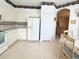 Charming kitchen features white cabinets and a spacious layout at 603 Russ Pond Dr, Kissimmee, FL 34759