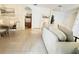 Inviting living room with tile flooring and neutral décor at 603 Russ Pond Dr, Kissimmee, FL 34759