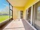 A view of the home's brick-paved lanai with a screen enclosure and a clear view of the yard at 603 Russ Pond Dr, Kissimmee, FL 34759