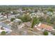 Aerial view of a neighborhood with tree-lined streets and well-maintained homes at 606 Forest Dr, Casselberry, FL 32707