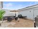 Private backyard patio features cozy seating, a grill, and ample space for outdoor relaxation and entertaining at 6067 Blue Lily Way, Winter Garden, FL 34787