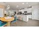 Bright kitchen with stainless steel appliances and a breakfast bar at 6067 Blue Lily Way, Winter Garden, FL 34787