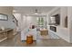Cozy living area featuring an electric fireplace and stylish decor at 6067 Blue Lily Way, Winter Garden, FL 34787
