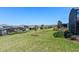 Expansive backyard features well-maintained lawn and mature landscaping at 637 Conservation Blvd, Groveland, FL 34736