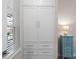 Custom built-in closet with drawers and cabinets, offering ample storage at 637 Conservation Blvd, Groveland, FL 34736