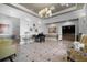 Community lobby features elegant lighting, tiled floors, and comfortable seating, adding to the building's appeal at 637 Conservation Blvd, Groveland, FL 34736
