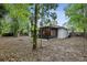 This private backyard features a screened in porch, creating the perfect outdoor retreat at 703 Sailfish Rd, Winter Springs, FL 32708