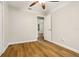 Bedroom with wood floors, neutral paint, and ample natural light at 703 Sailfish Rd, Winter Springs, FL 32708