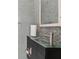 Bathroom features stylish tile backsplash, modern sink, and sleek fixtures at 8244 Oakland Pl, Orlando, FL 32819