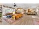 Spacious living area showcasing an open floor plan, elegant decor, and seamless transition to adjacent spaces at 8244 Oakland Pl, Orlando, FL 32819