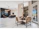 Dining area with modern furniture, elegant lighting, and easy access to the living room and outdoor areas at 8336 Boyla Ct, Windermere, FL 34786