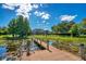 A private boat dock on a waterfront property, offering a serene escape with convenient access to the lake at 8336 Boyla Ct, Windermere, FL 34786