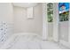 Stylish room with sleek marble floors, elegant window treatments, and cheerful wallpaper featuring cute rabbit prints at 8336 Boyla Ct, Windermere, FL 34786