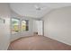 Bright bedroom with neutral paint, carpet, windows, ceiling fan, and closet at 995 Casa Del Sol Cir, Altamonte Springs, FL 32714