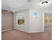Bedroom featuring neutral walls, a ceiling fan, carpeted flooring, and natural light from a window at 995 Casa Del Sol Cir, Altamonte Springs, FL 32714