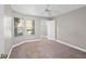 Cozy bedroom featuring neutral paint and carpet, ceiling fan, and closet at 995 Casa Del Sol Cir, Altamonte Springs, FL 32714