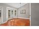 Bright dining area featuring hardwood floors, modern lighting, and a view to the patio at 995 Casa Del Sol Cir, Altamonte Springs, FL 32714