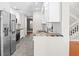 Modern kitchen with stainless steel appliances, granite countertops, and tile flooring at 995 Casa Del Sol Cir, Altamonte Springs, FL 32714