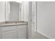 Bathroom featuring vanity with sink, mirror, and tile floors at 1242 Butterfly Orchid Rd, Davenport, FL 33837