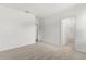 Spacious bedroom with neutral carpet and an ensuite bathroom at 1242 Butterfly Orchid Rd, Davenport, FL 33837