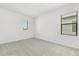 Neutral bedroom featuring plush carpet, neutral walls and natural light at 1242 Butterfly Orchid Rd, Davenport, FL 33837