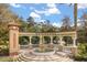 Watersong community entrance monument with beautiful landscaping and a water fountain adding to the beauty at 1242 Butterfly Orchid Rd, Davenport, FL 33837
