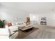 Comfortable loft area with plush carpeting and stylish furnishings at 1242 Butterfly Orchid Rd, Davenport, FL 33837