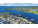 A scenic aerial view shows a lake community filled with waterfront homes at 16629 Broadwater Ave, Winter Garden, FL 34787