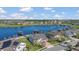 Aerial view displays lakeside homes with personal boat docks extending into the water at 16629 Broadwater Ave, Winter Garden, FL 34787