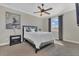 Cozy bedroom with a ceiling fan, a window, and natural light at 16629 Broadwater Ave, Winter Garden, FL 34787