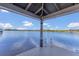 Waterfront dock with aluminum ladders to the water and lovely lake views at 16629 Broadwater Ave, Winter Garden, FL 34787