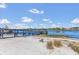Exterior shot of a home with an extended dock and beach access at 16629 Broadwater Ave, Winter Garden, FL 34787