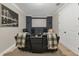 Home theater with comfortable seating and a large screen for entertainment at 16629 Broadwater Ave, Winter Garden, FL 34787