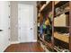 Well-organized mudroom with built-in shelving, storage baskets, and coat hooks offers practical space for everyday needs at 16629 Broadwater Ave, Winter Garden, FL 34787