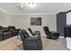 The theater room features reclining leather chairs and a projector at 16629 Broadwater Ave, Winter Garden, FL 34787