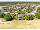 A golf community with houses nestled in a neighborhood near the lush golf course at 1720 Bridgets Ct, Kissimmee, FL 34744