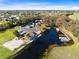 Scenic aerial view of a community boat ramp/storage area, showcasing easy access to the water and boating amenities at 1720 Bridgets Ct, Kissimmee, FL 34744
