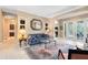 Inviting living room with neutral tones and many windows offering a bright and airy atmosphere at 1720 Bridgets Ct, Kissimmee, FL 34744