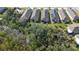 An aerial view of properties backing onto lush conservation land at 17398 Blazing Star Cir, Clermont, FL 34714