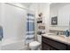 Charming bathroom with tub, shower, granite counters and vanity at 17398 Blazing Star Cir, Clermont, FL 34714