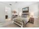Bright bedroom with natural light, neutral decor, and ensuite access at 17398 Blazing Star Cir, Clermont, FL 34714