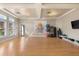 Bright fitness studio with bamboo floors, mirrors, and fitness equipment at 17398 Blazing Star Cir, Clermont, FL 34714