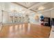 Bright fitness studio with bamboo floors, mirrors, and fitness equipment at 17398 Blazing Star Cir, Clermont, FL 34714