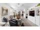 Spacious living room boasts neutral tones, contemporary furnishings, and an open layout with lots of light at 17398 Blazing Star Cir, Clermont, FL 34714