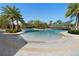 Inviting community swimming pool with covered seating and lounge chairs at 17398 Blazing Star Cir, Clermont, FL 34714