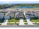 Aerial view of the property showcasing its proximity to a beautiful lake at 1773 Groveline Rd, St Cloud, FL 34771