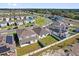 Panoramic aerial view of the neighborhood showcasing the homes, and community layout at 1773 Groveline Rd, St Cloud, FL 34771