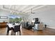 Open-concept living area with ample seating, natural light, and view of outdoor space at 2087 Flora Pass Pl, Kissimmee, FL 34747
