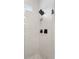 Contemporary shower design features modern fixtures, a tiled niche, and glass enclosure at 2087 Flora Pass Pl, Kissimmee, FL 34747
